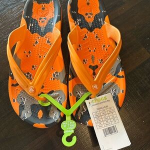 CROCS Orange Camo Flip Flops